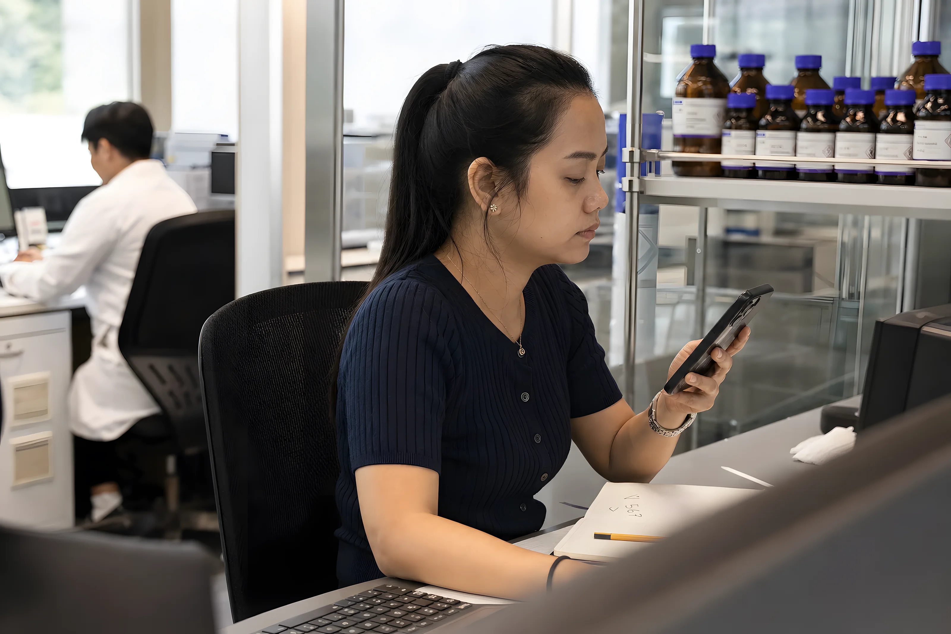 A VKA colleague at her desk in the Singapore office